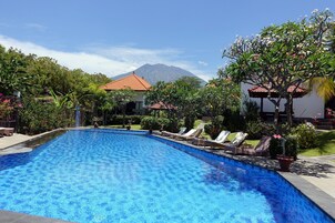 3 outdoor pools, open 7:00 AM to 9:00 PM, pool umbrellas, sun loungers