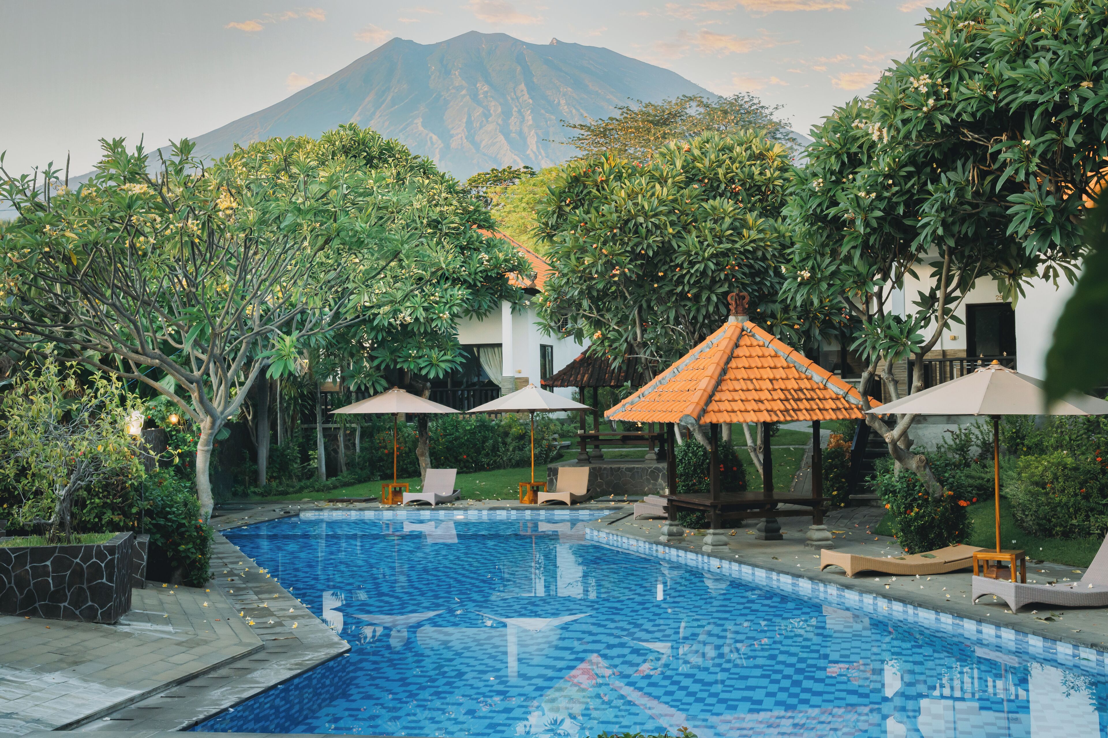 3 outdoor pools, open 7:00 AM to 9:00 PM, pool umbrellas, pool loungers