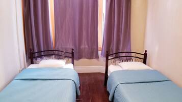 Standard Twin Room, 2 Twin Beds ( Shared Hallway Bathroom) | In-room safe, desk, free WiFi, bed sheets