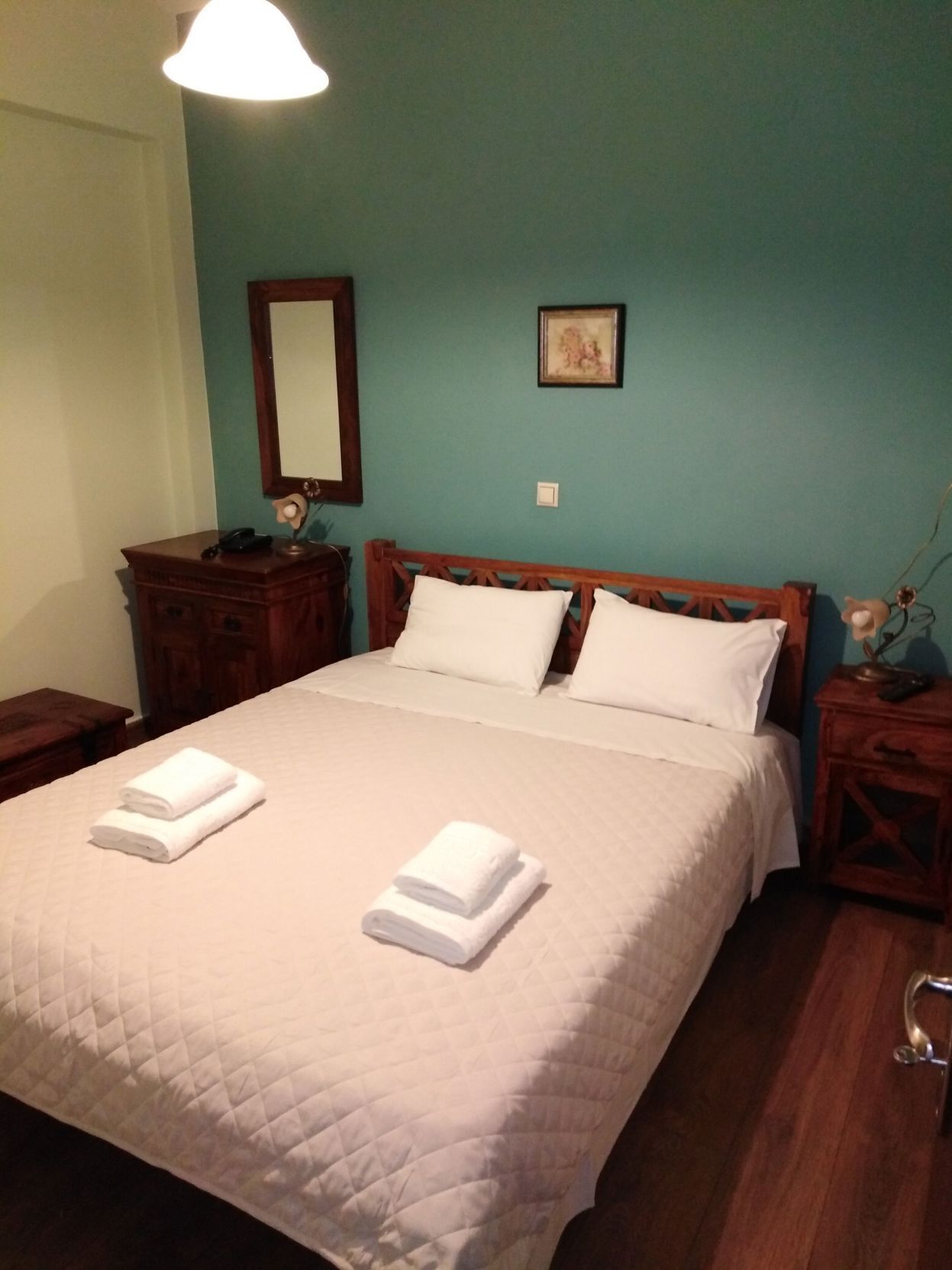 Hypo-allergenic bedding, desk, laptop workspace, blackout curtains