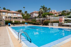 Outdoor pool, pool umbrellas, sun loungers