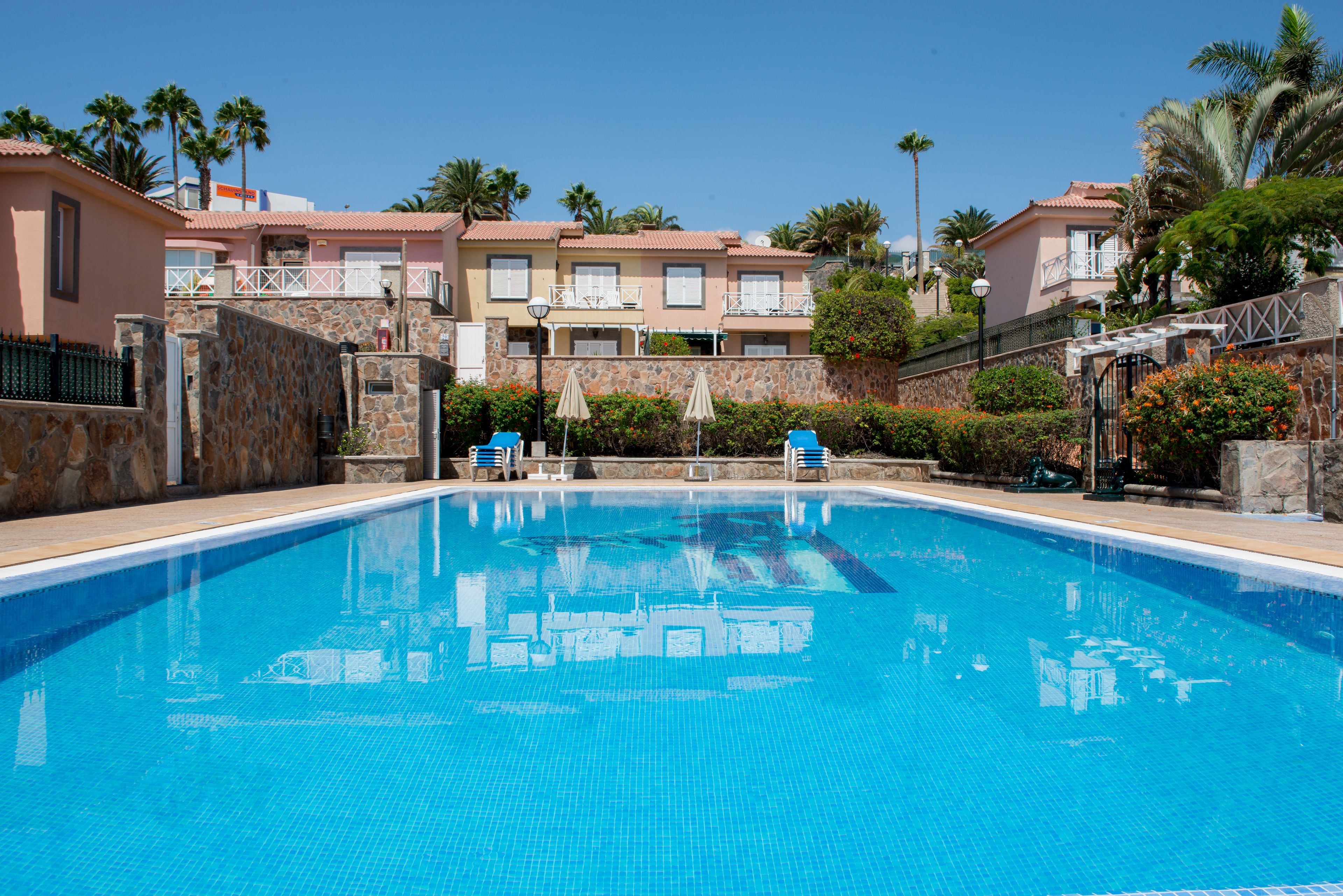 Outdoor pool, pool umbrellas, pool loungers