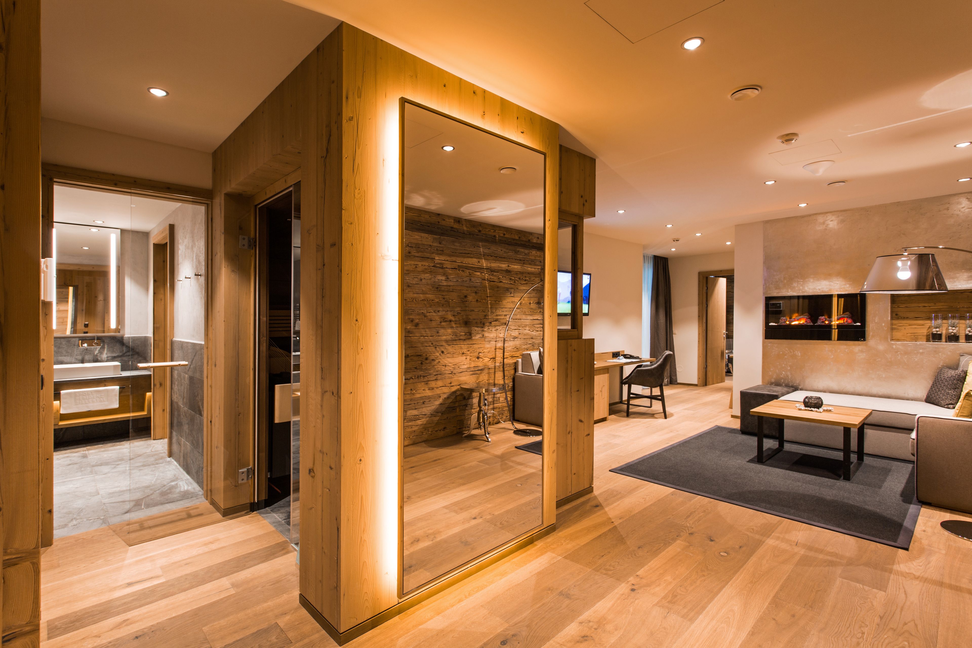 family suite, 2 bedrooms, sauna | living area | 107-cm flat-screen tv with cable channels, tv, heated floors