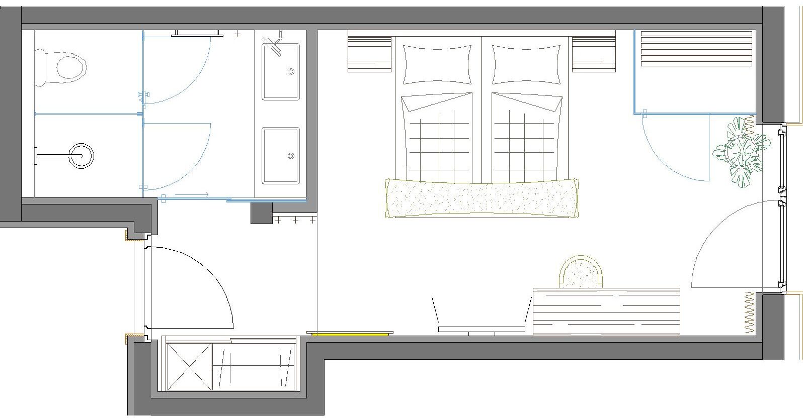 Plano de planta de una habitación de hotel con baño, pequeña cocina, zona de estar y ventana con cortinas.
