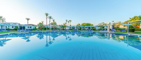 2 outdoor pools, pool umbrellas, sun loungers