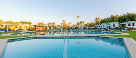 2 outdoor pools, pool umbrellas, sun loungers