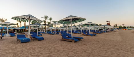 Private beach, sun loungers, beach umbrellas, beach towels