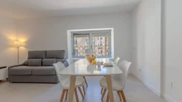 Apartment, 1 Bedroom | Living area | Flat-screen TV