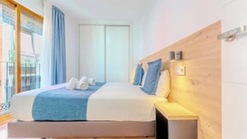 Apartment, 1 Bedroom | 1 bedroom, blackout drapes, iron/ironing board, free cribs/infant beds
