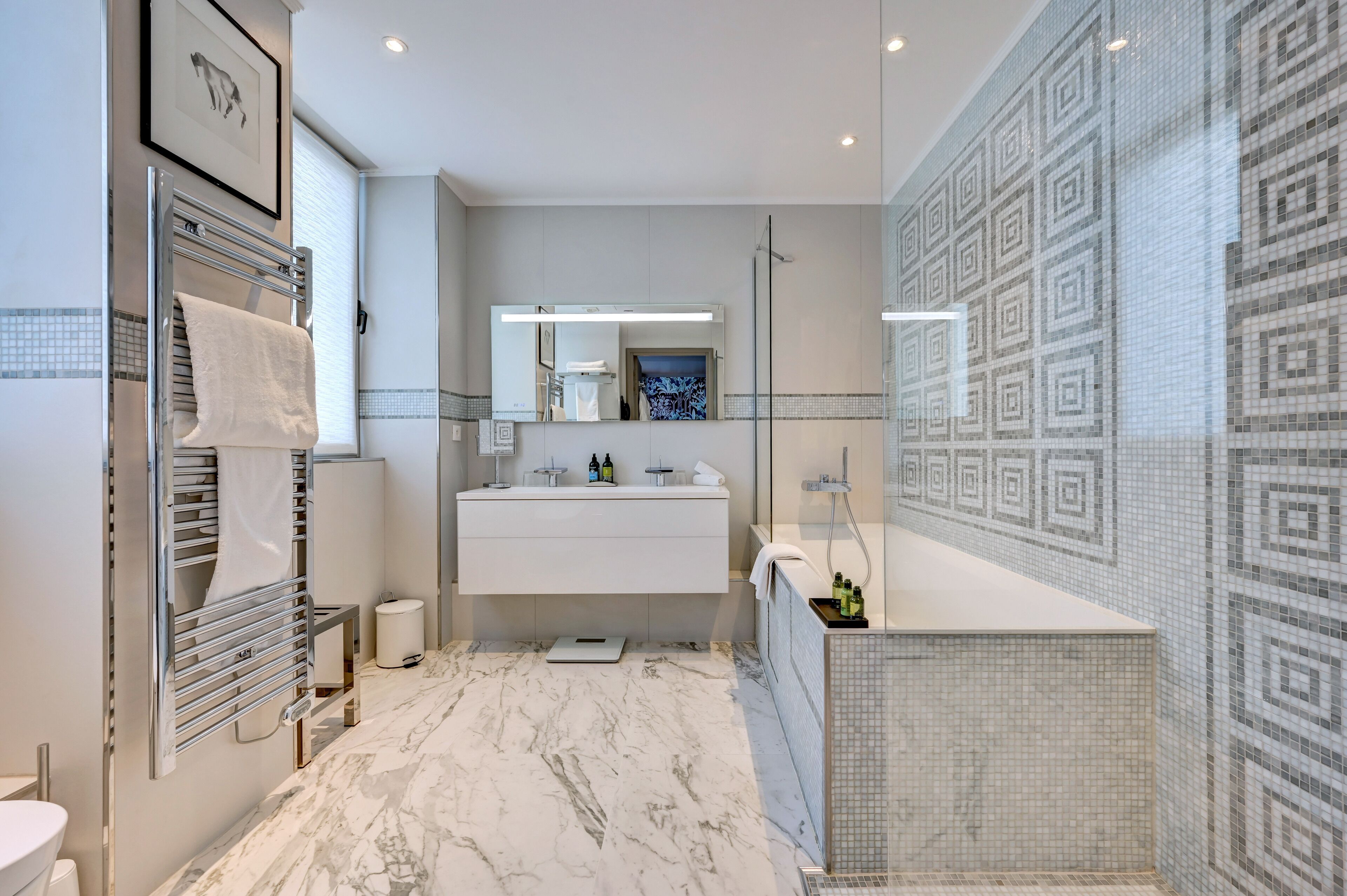 designer toiletries, hair dryer, bathrobes, slippers