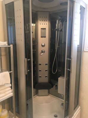 Coastal Room with Harbor Bridge View | Bathroom shower - Capri Beach Hotel (Corpus Christi)
