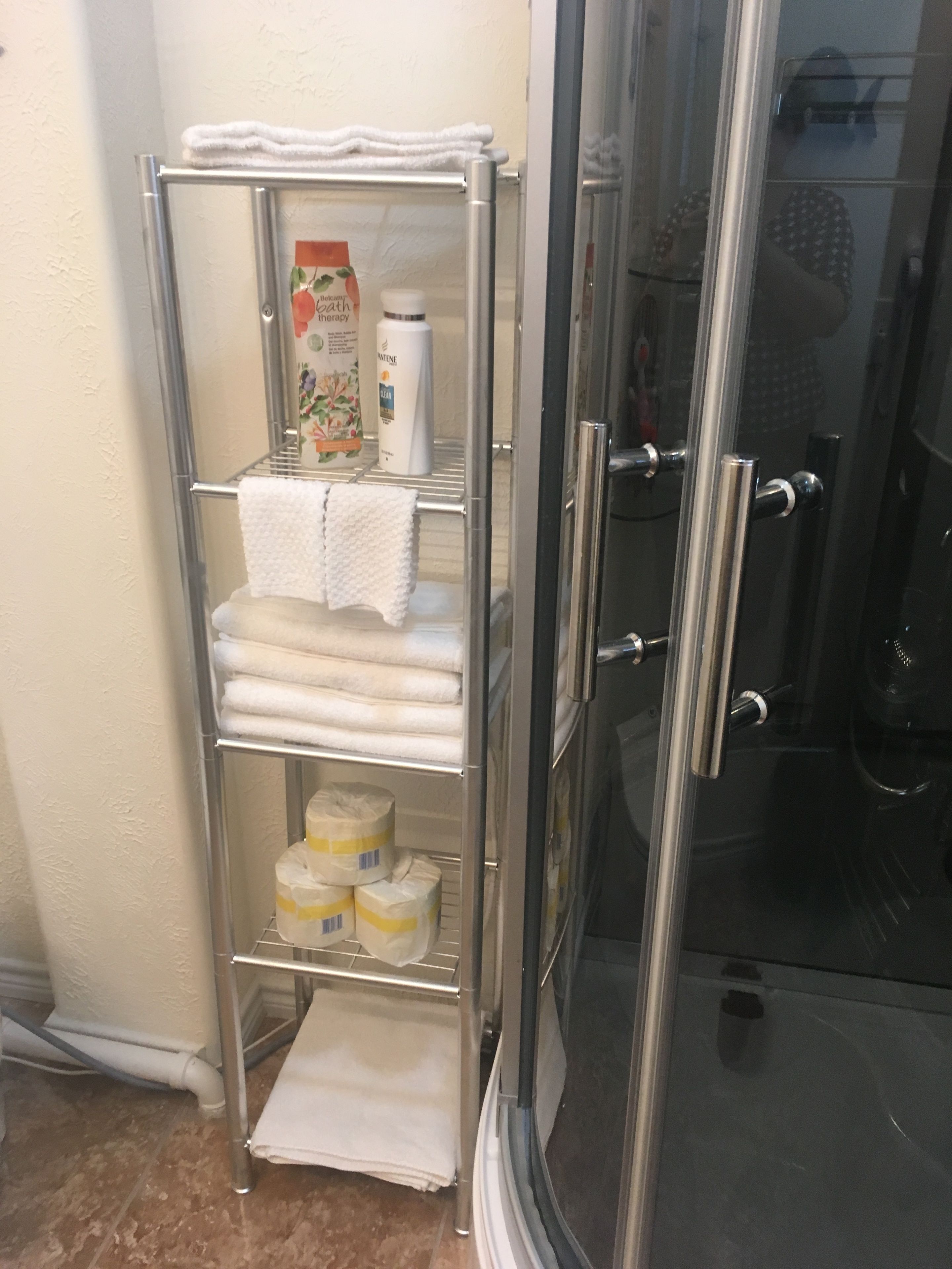 coastal room with harbor bridge view | bathroom amenities | designer toiletries, hair dryer, towels