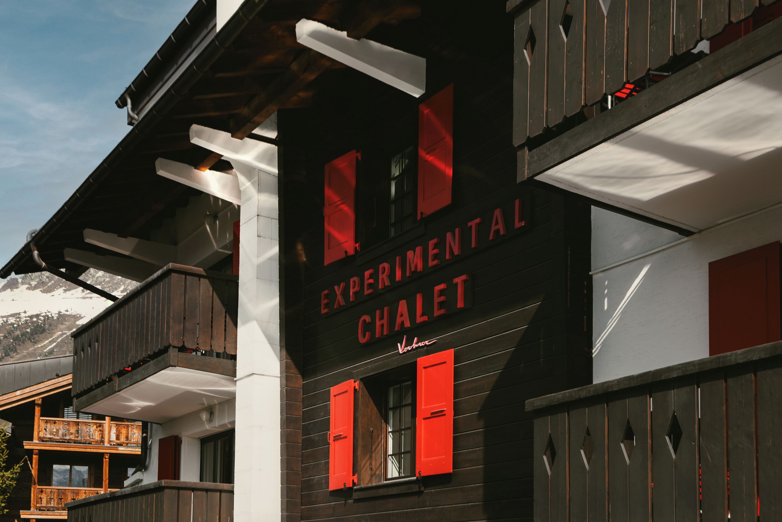 A building with a sign reading "Experimental Chalet."