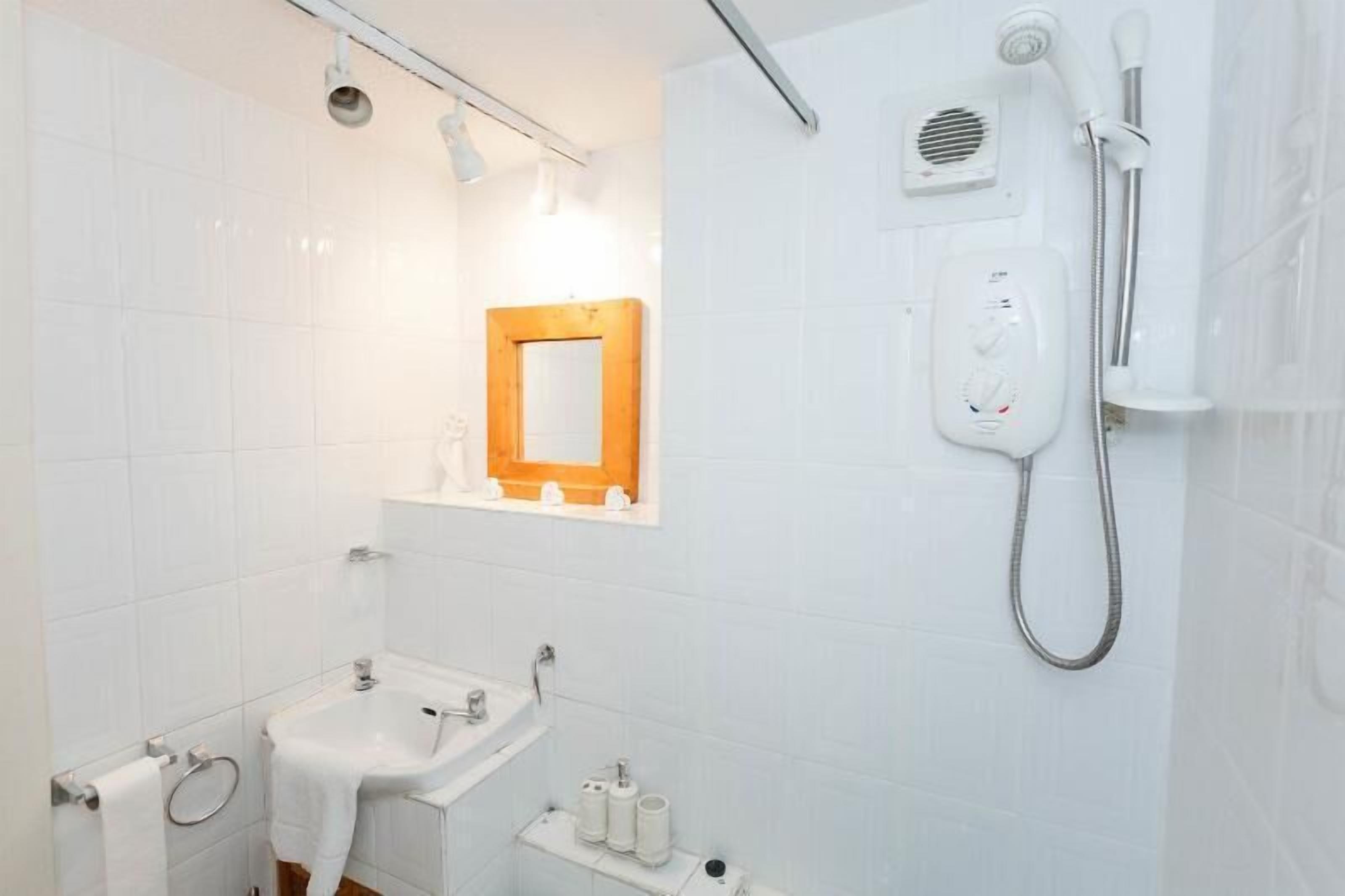 Regadera en el baño