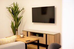 50-tums platt-tv med satellitkanaler och tv