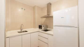 Studio | Private kitchen | Full-size fridge, microwave, stovetop, coffee/tea maker
