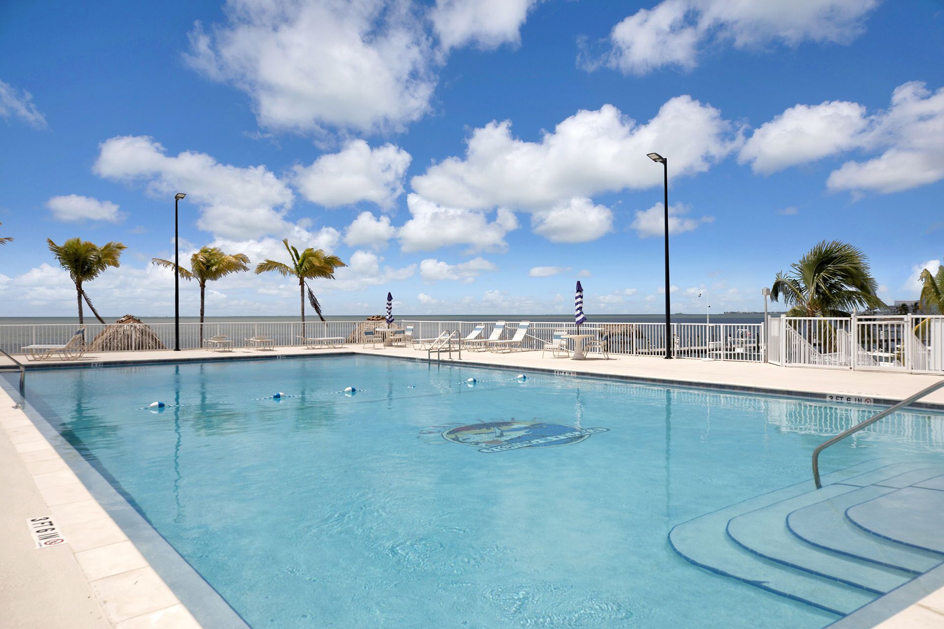 Outdoor pool, open 7 AM to 10 PM, sun loungers