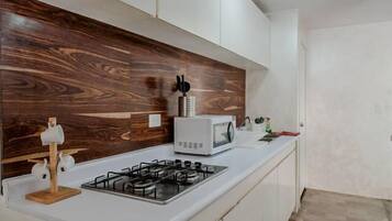 Apartment, 2 Bedrooms | Private kitchen | Fridge, microwave, coffee/tea maker