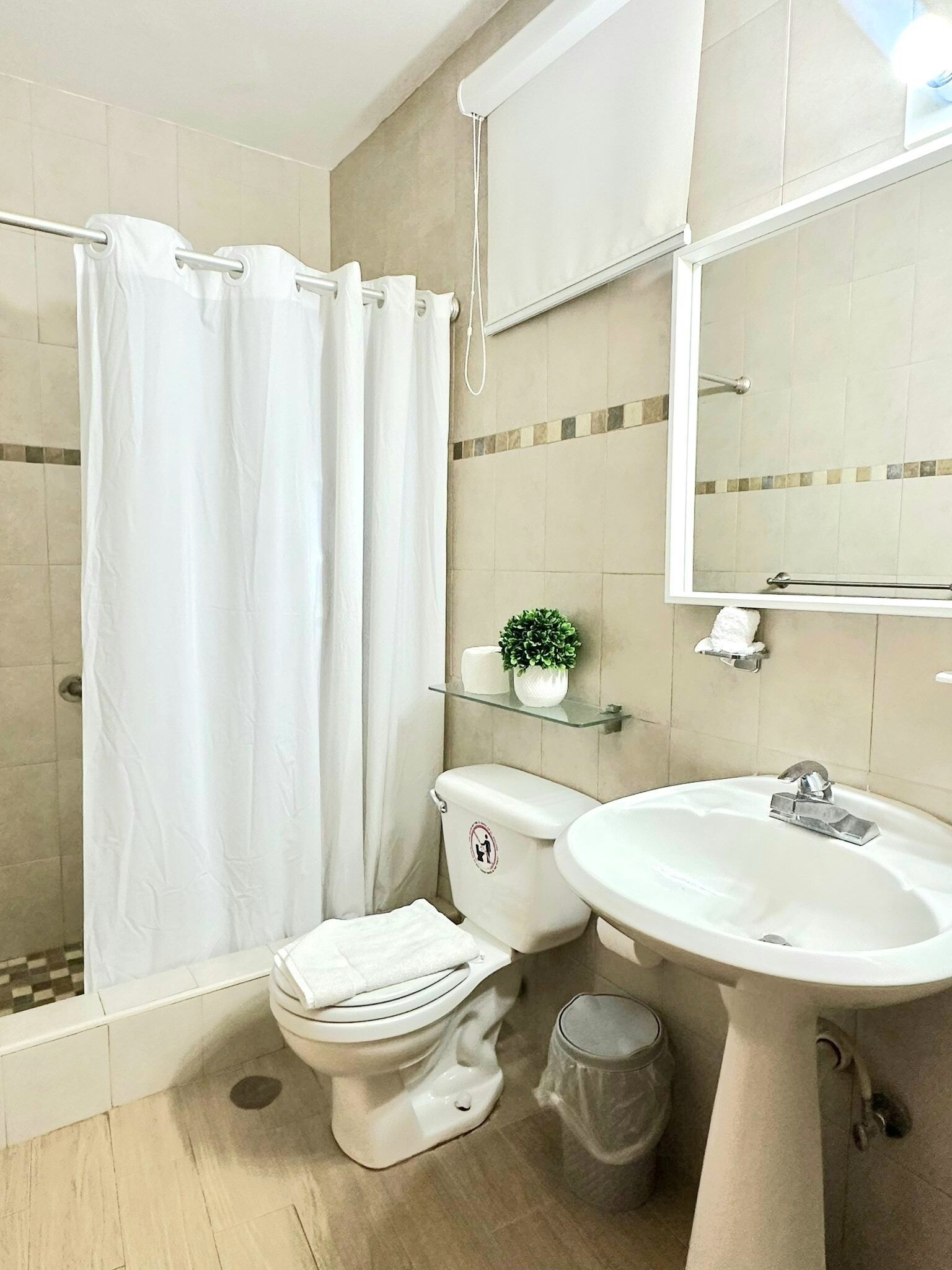 standard double room | bathroom | shower, hair dryer, towels