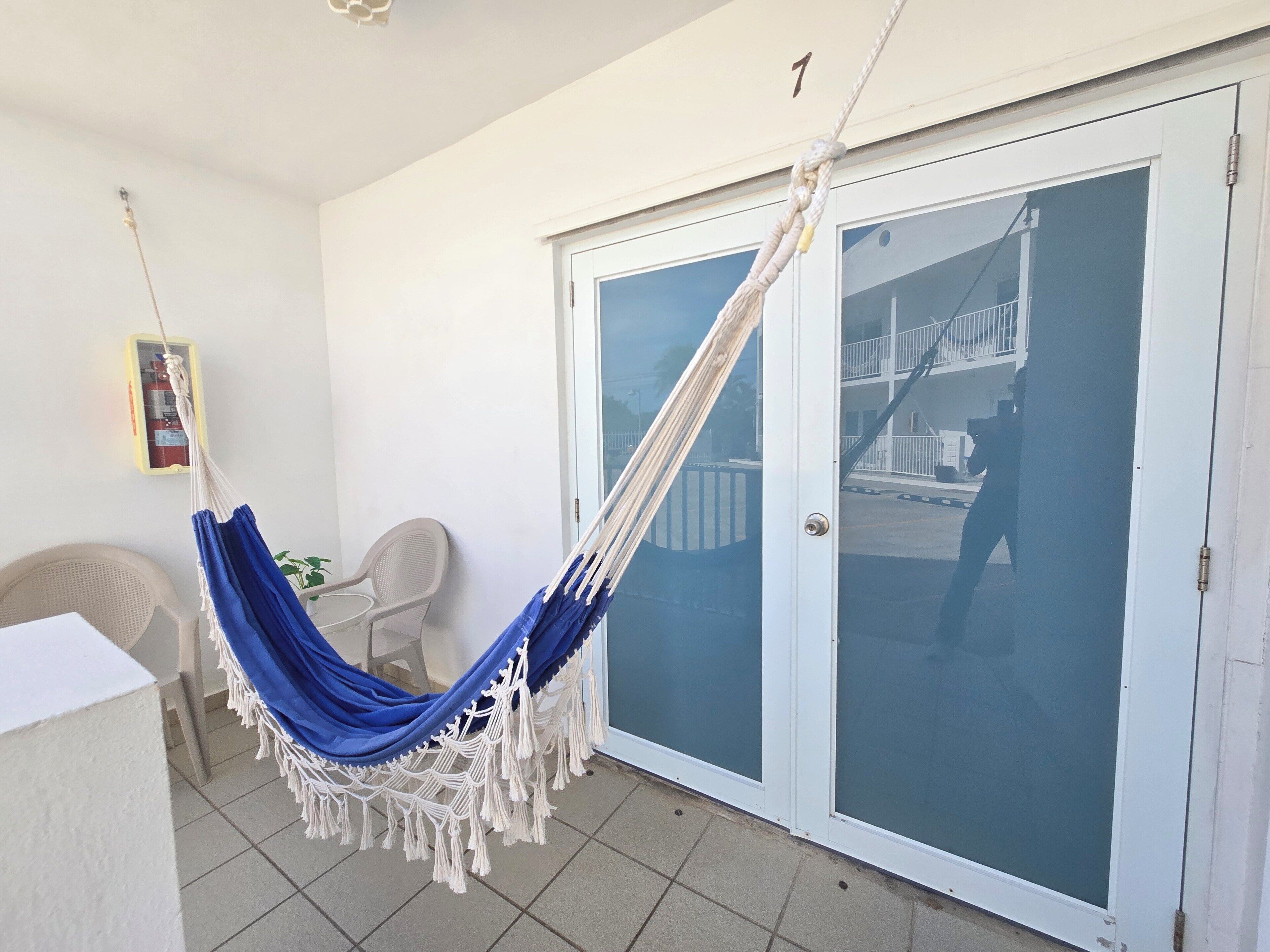 Standard room, 2 double beds with balcony | Iron/ironing board, free WiFi, bed sheets