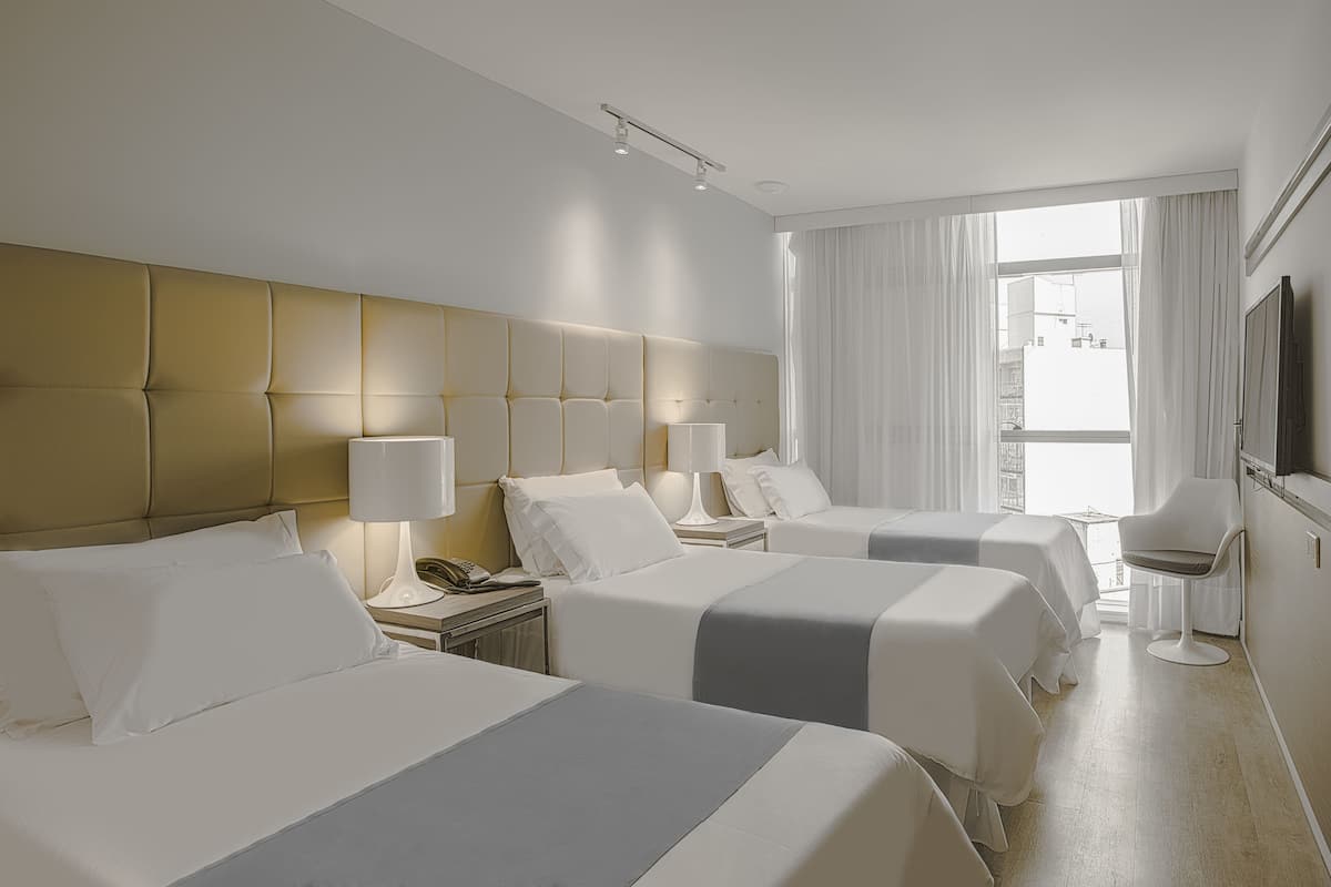 Superior Triple Room | Minibar, in-room safe, soundproofing, iron/ironing board