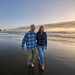 Couples can stroll along the beach, taking in the serene atmosphere.