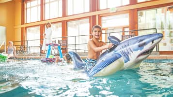 Swimmers can enjoy the pool with a fun inflatable shark float.