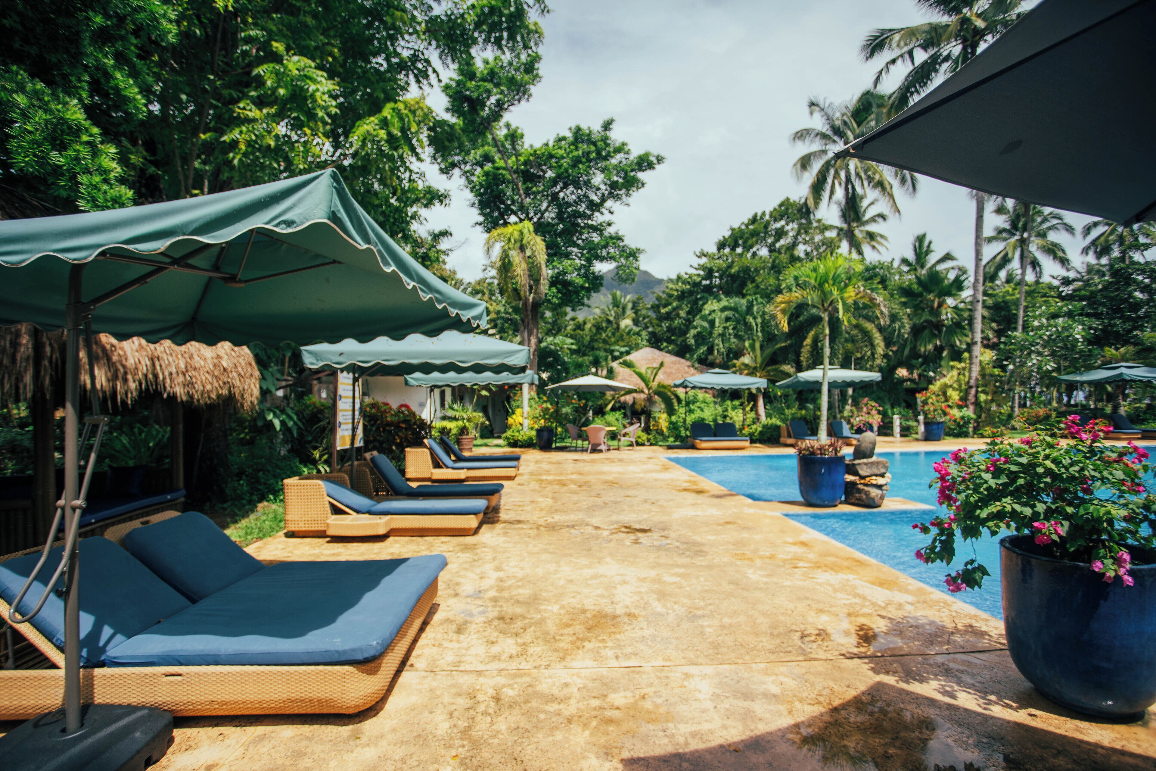 2 outdoor pools, pool umbrellas, pool loungers