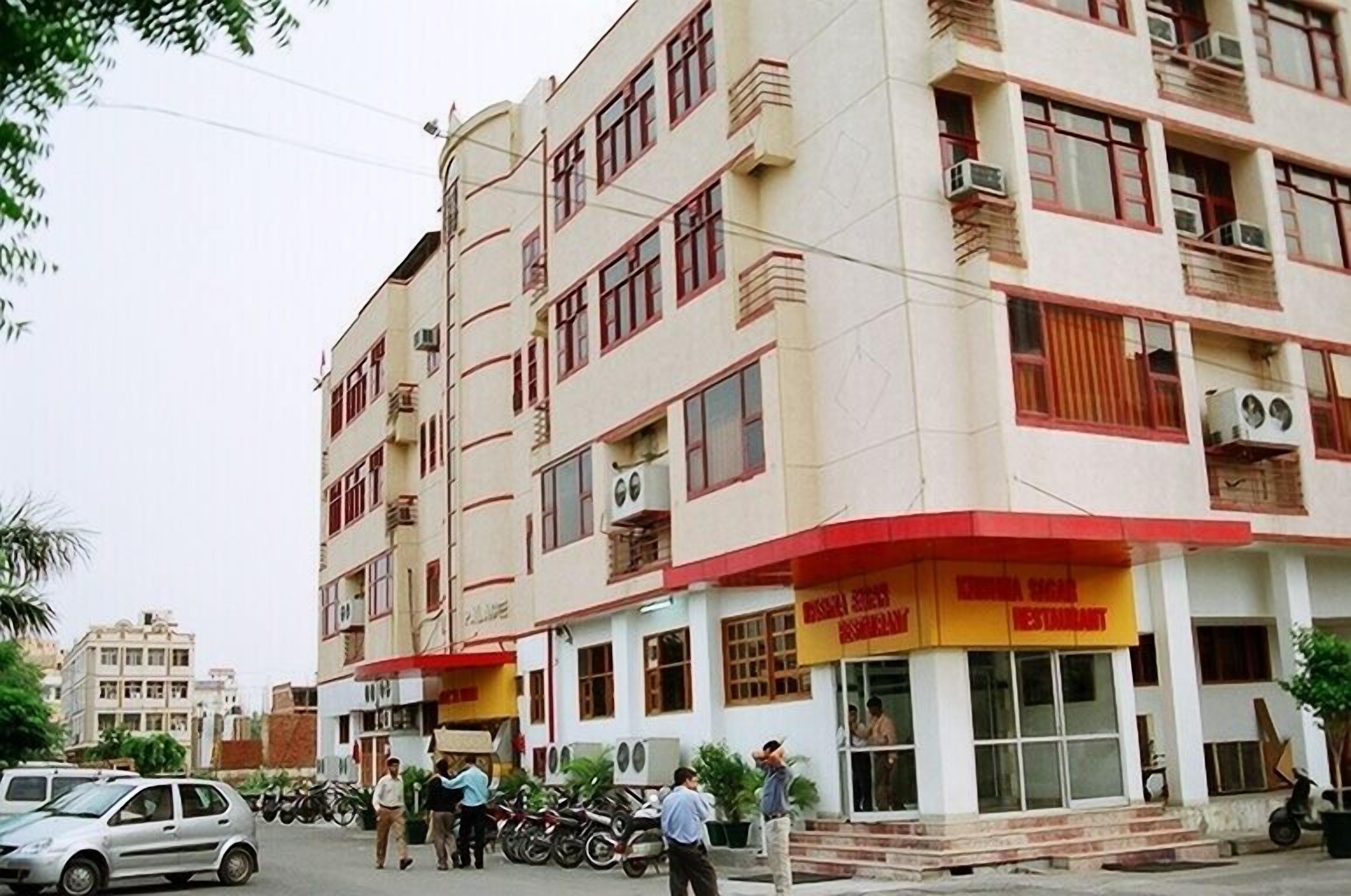 A multi-story building with a restaurant on the ground floor.