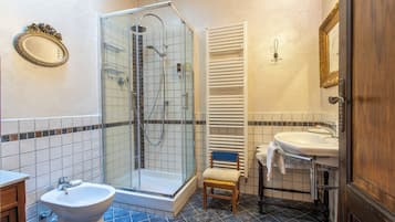 Shower, free toiletries, hair dryer, slippers