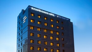 A tall building with the sign "BUSAN BUSINESS HOTEL" at the top. - Busan Business Hotel (Busan)