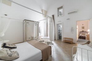 Laptop workspace, blackout curtains, soundproofing, cots/infant beds