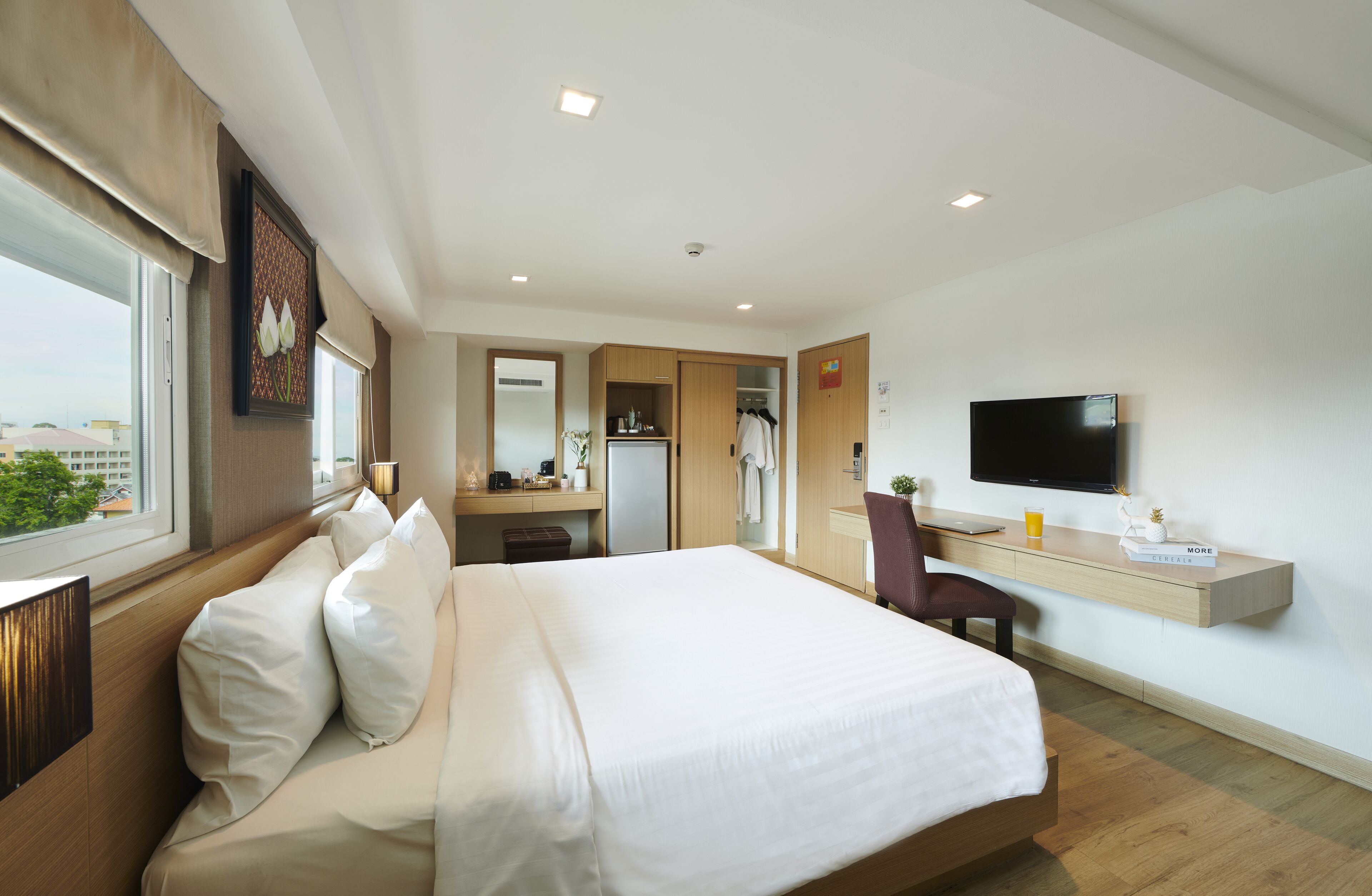 deluxe double room | premium bedding, in-room safe, desk, laptop workspace