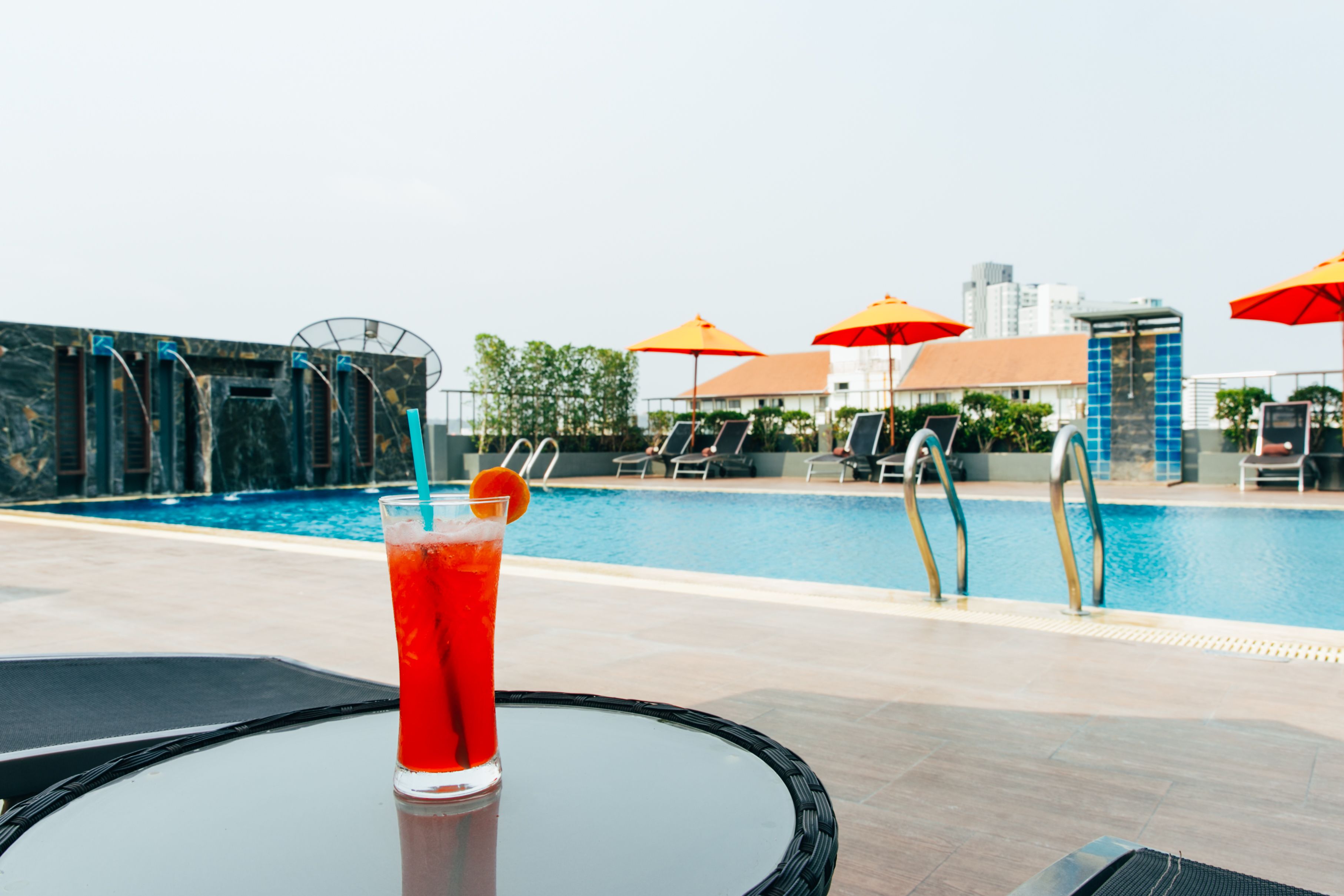 outdoor pool, pool umbrellas, pool loungers