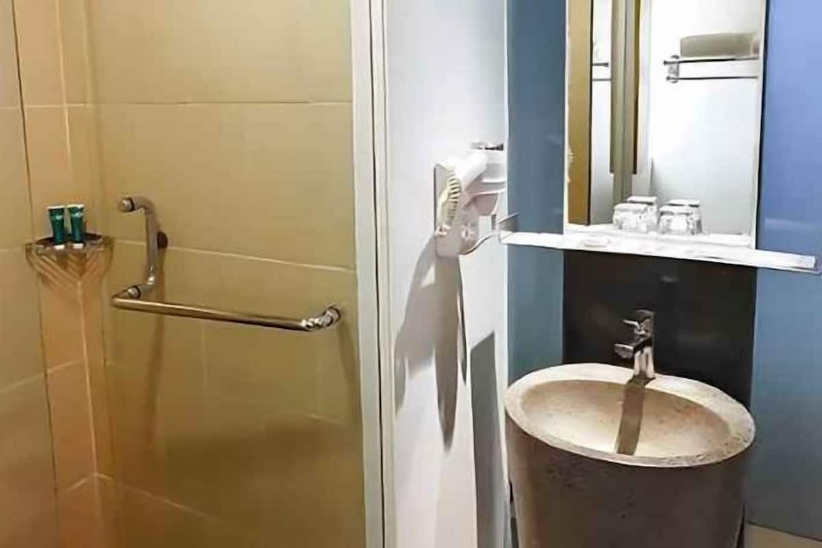 Bathroom | Hair dryer, bathrobes, slippers, bidet