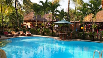 Outdoor pool, open 7:00 AM to 10:00 PM, pool loungers