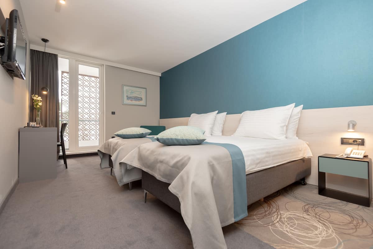 superior double or twin room | minibar, in-room safe, desk, blackout curtains