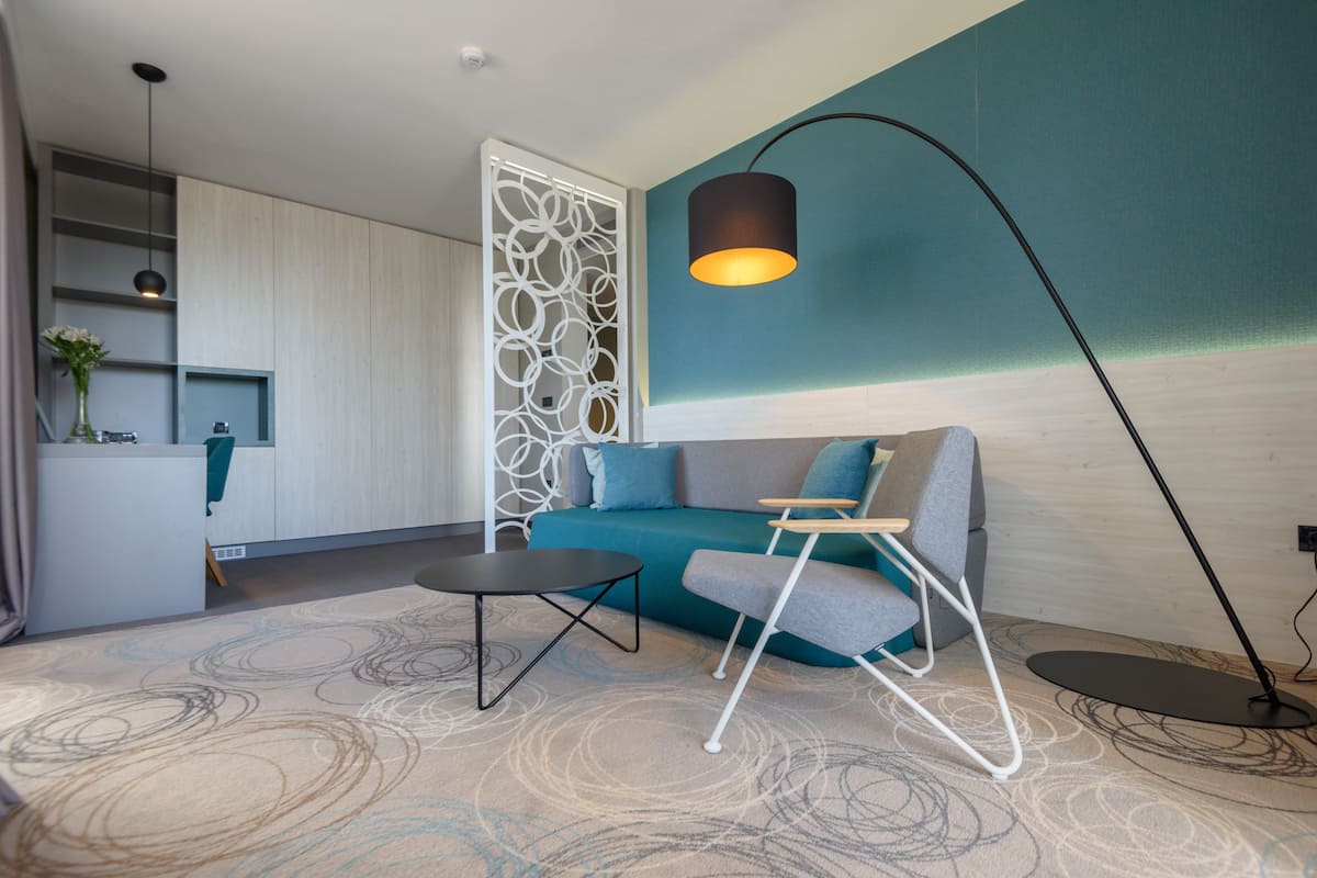 superior suite | minibar, in-room safe, desk, blackout curtains