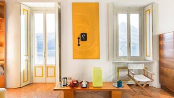 Suite, 1 Queen Bed, Lake View | Living area