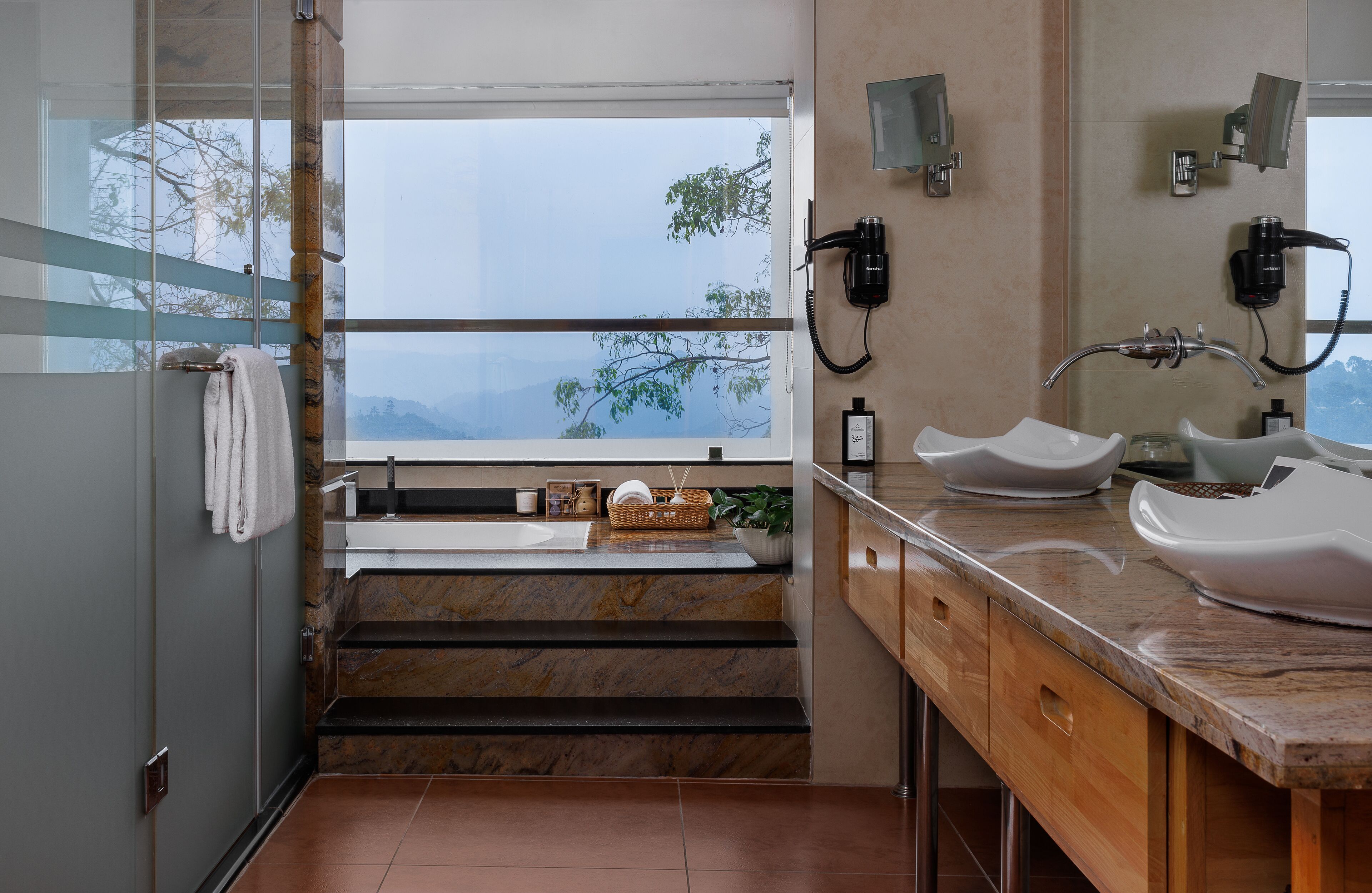 panoramic suite | bathroom | rainfall showerhead, free toiletries, hair dryer, slippers