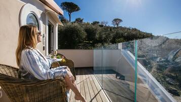 Suite, 1 trĂšs grand lit, vue mer | Terrasse/Patio