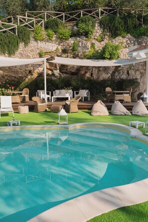Outdoor pool, open 10:00 AM to 6:00 PM, pool umbrellas, sun loungers