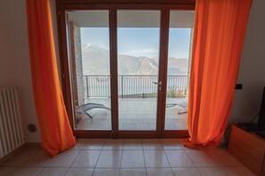 Apartment, 2 Bedrooms, Lake View | Living area | Flat-screen TV - Residence Dorio (Dorio)