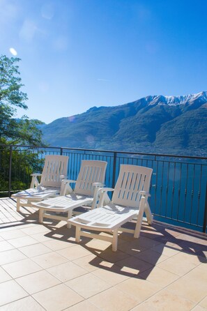 Seasonal outdoor pool, open 8:00 AM to 9:00 PM, pool umbrellas