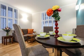 Executive Studio | Living area | Flat-screen TV