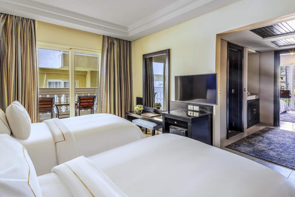 Family Room, 2 Double Beds | 1 bedroom, free minibar, in-room safe, blackout drapes