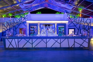 12 bars/lounges, 4 poolside bars, swim-up bar, beach bar
