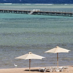 Private beach, free beach shuttle, beach cabanas, sun loungers