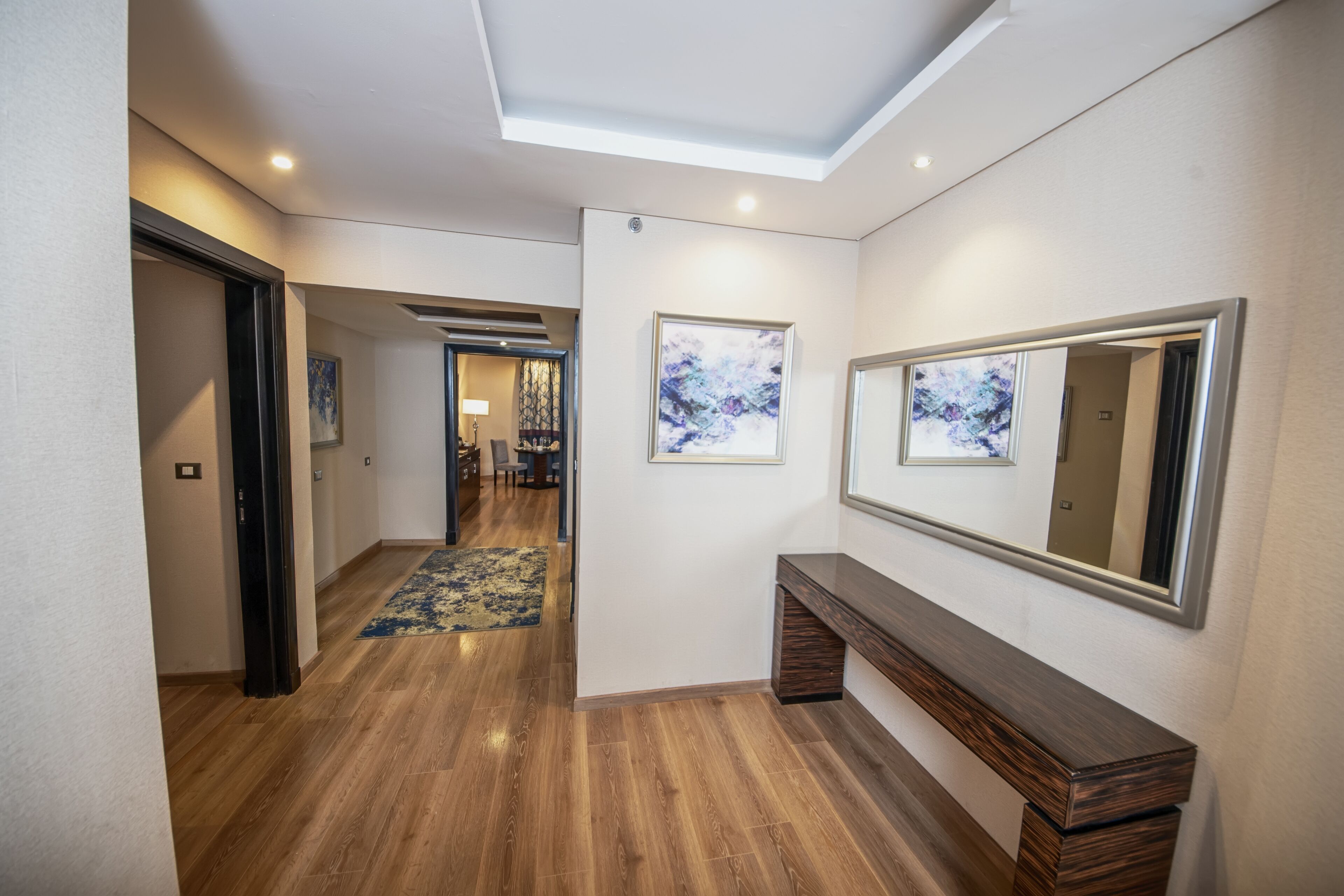 deluxe suite, multiple beds (aqua) | 1 bedroom, free minibar, in-room safe, blackout curtains