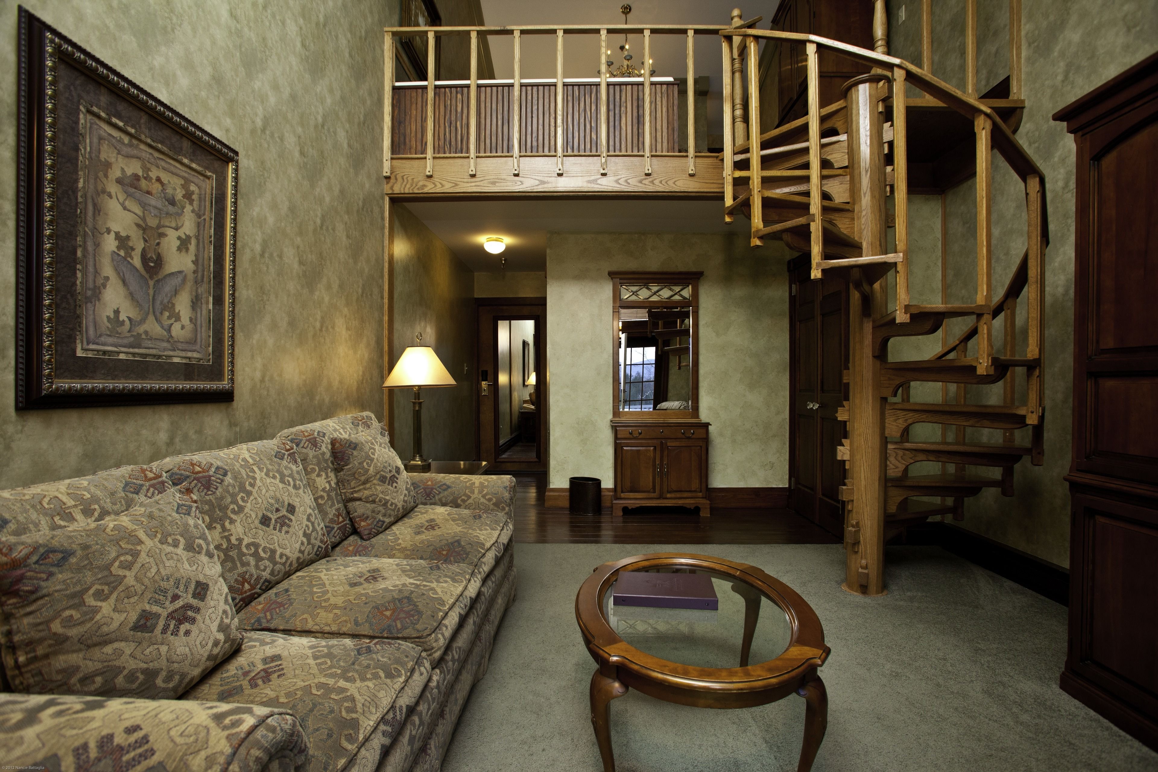 classic suite, lakeview with whirlpool tub | living area | flat-screen tv